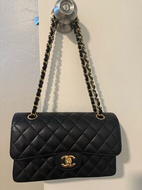 CHANEL Double flap quilted caviar handbag